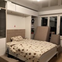 Шкаф-кровать с зонами для хранения 32