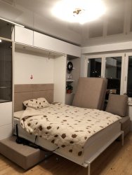 Шкаф-кровать с зонами для хранения 32